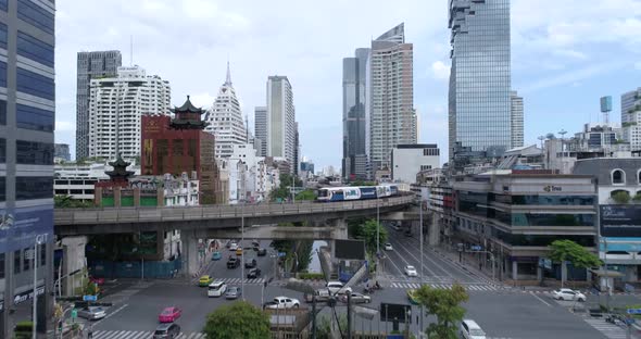 Fly up shot of the Chong nonsi / Silom intersection in Bangkok, Thailand.