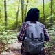 African American Man With Backpack Walks Through Forest - VideoHive Item for Sale