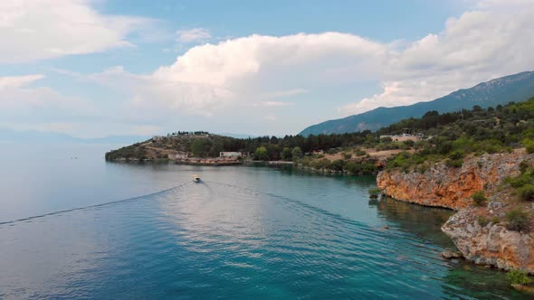 Aerial shot of Macedonia coast. Clif and beautiful water around Ohrid Lake in Southern Europe.