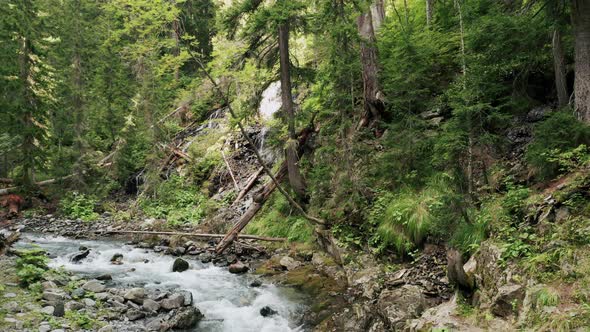 Aerial view; drone flying over beautiful mountain river