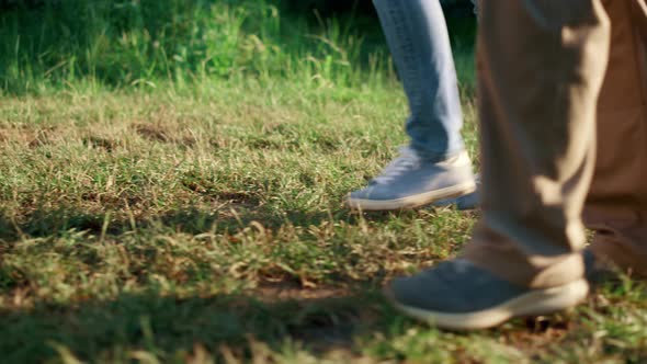 Two Farmers Legs Walking Garden Together