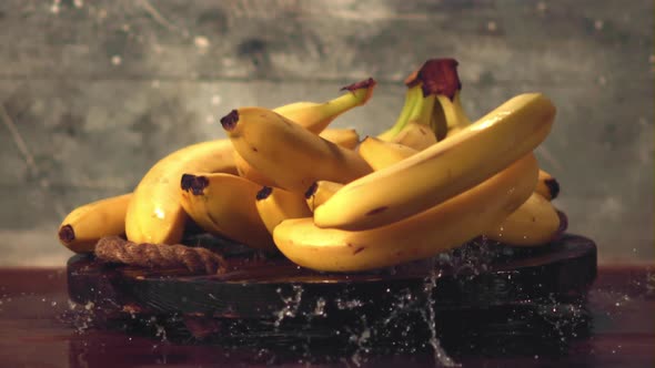 Super Slow Motion Tray with Bananas Falls on the Table