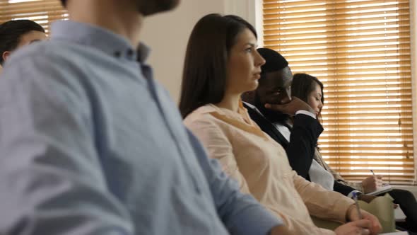 Close Up Diverse Members of Business Meeting