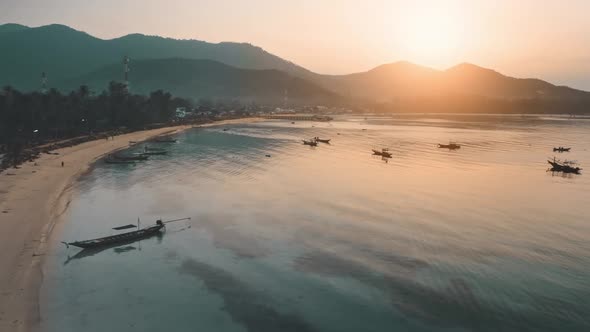 Sunset Over Sea and Mountains