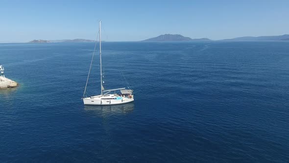 Sailing Yacht At The Marina Entrance