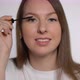Young Beautiful Woman Doing Makeup - VideoHive Item for Sale