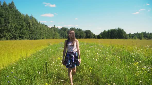 Girl Walking on the Field.