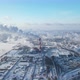 Smoke from the pipes of a chemical enterprise top view. Panorama of the factory in winter. - VideoHive Item for Sale