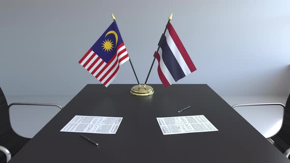 Flags of Malaysia and Thailand and Papers alt