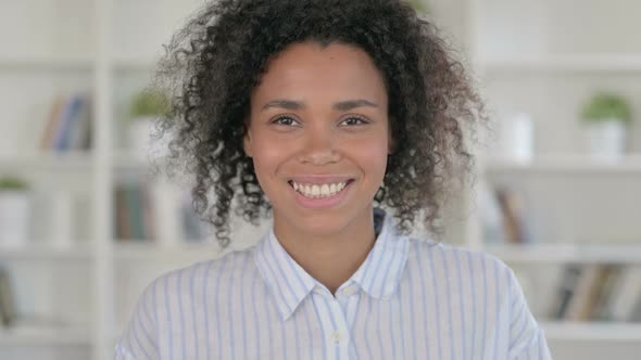 Smiling African Woman Looking at Camera