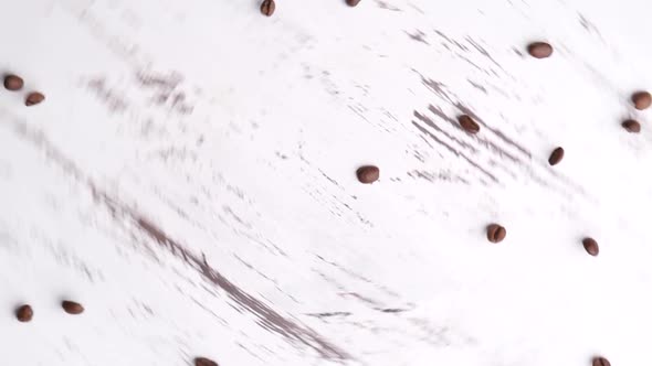 Coffee Beans Forming Heart on Spinning Table