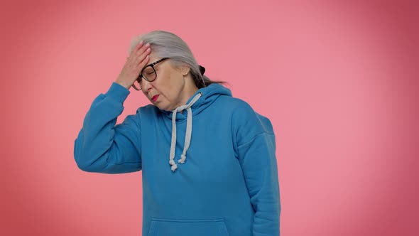 Upset Senior Granny Woman Making Face Palm Gesture Feeling Bored Disappointed in Result Bad News