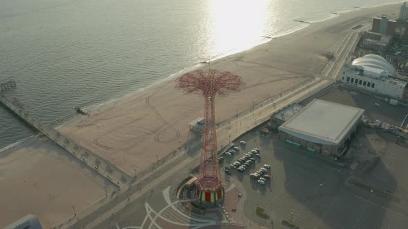 Aerial Shot Tilting Down as Drone Flies Over Coney Island's Parachute Tower