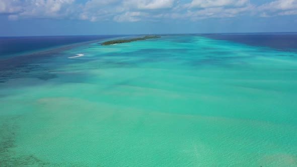 Aerial above tourism of tranquil bay beach holiday by blue sea and white sand background of a dayout