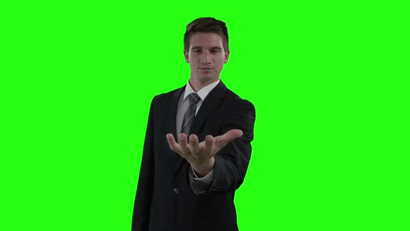 Businessman pretending to be hold invisible object