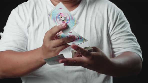 Magician Showing His Trick With Usual Cards