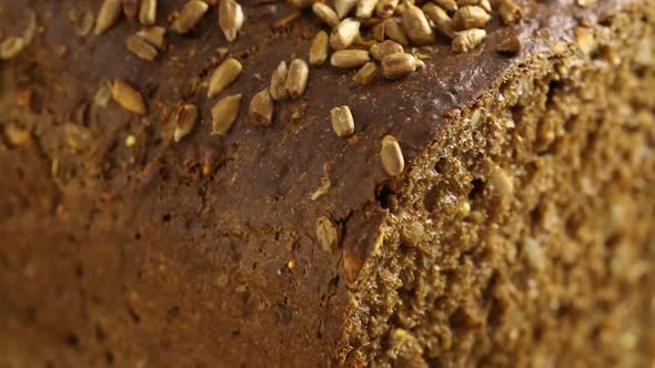 Healthy fresh baked dark multi grain bread close up