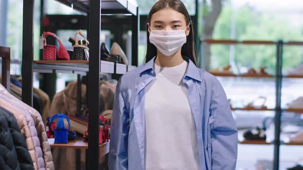 Asian Lady Seller with a Protective Mask Portrait