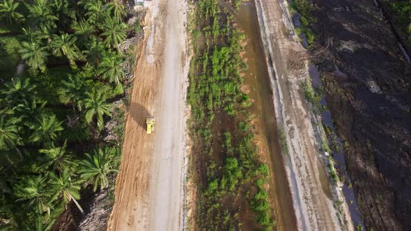 Roller truck move at rural scene of construction development