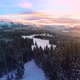 Snow capped mountains in the winter, at colorful sunset, aerial view. - VideoHive Item for Sale