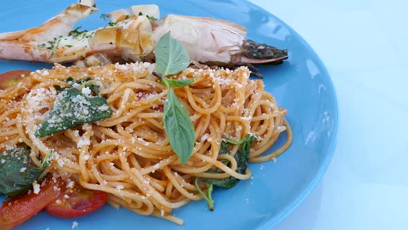 Spaghetti spicy seafood in white plate