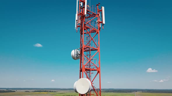 Aerial View of 4G and 5G Cell Tower with Antennas and Satellites