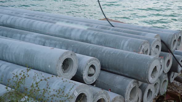 Concrete Pipes on the River Bank