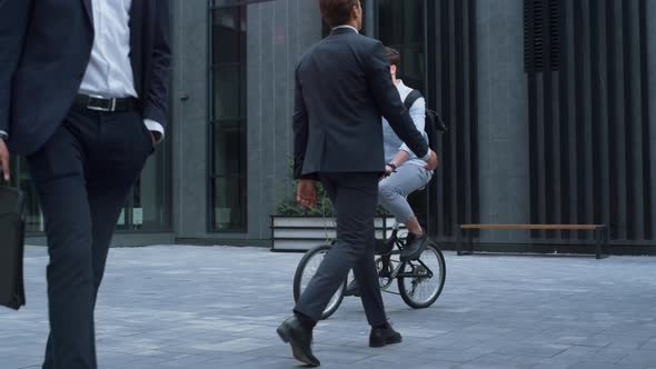 Office Manager Riding Bicycle Commuting to Work