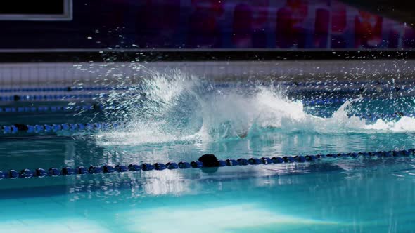 Swimmer training in a swimming pool