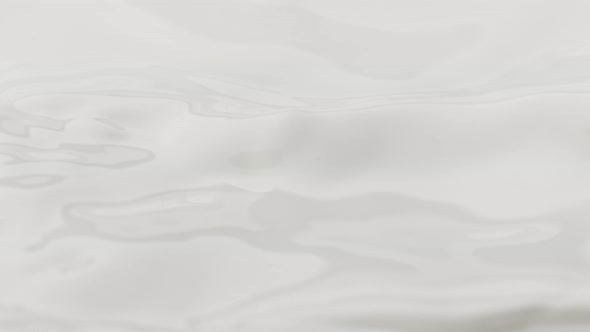 Super Slow Motion Shot of Waving Fresh Cream at 1000 Fps alt
