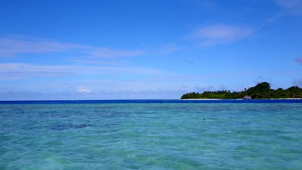 Drone travel of resort beach by blue lagoon with sand background