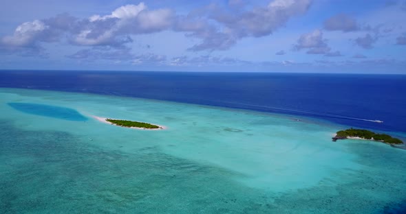 Luxury aerial abstract shot of a white sand paradise beach and aqua blue ocean background in colourf