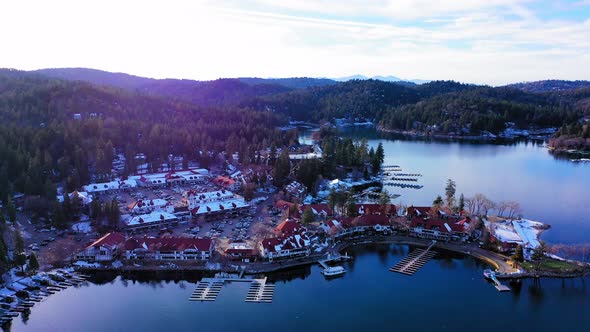 Flying over Lake Arrowhead Village with light snow.