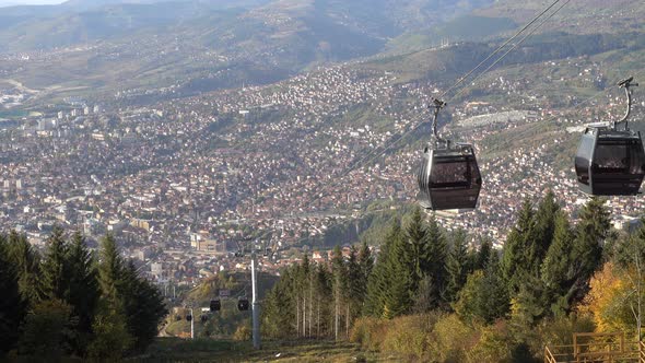 Cable Car Running With Town At Background
