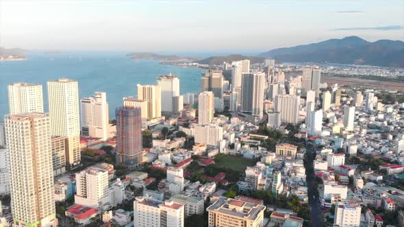 Drones Aerial Take a Beautiful View of the Big City From a Bird's Eye View with Skyscrapers or Tall