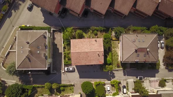 Top shot with a drone of some houses in the small city of Fabriano, in Italy during summer
