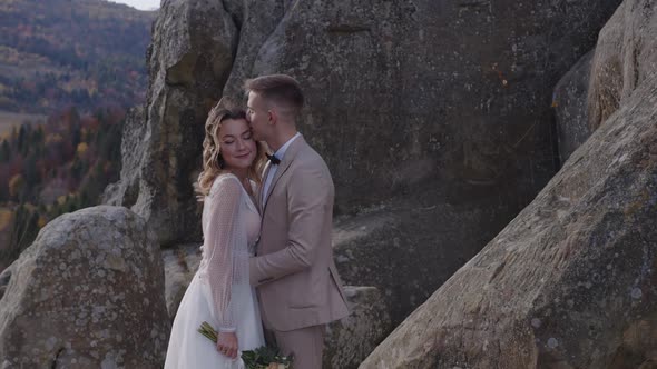 Wedding Couple in Mountain Rock