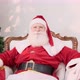 Santa Claus looking at the camera. Christmas is coming. Merry Christmas. - VideoHive Item for Sale