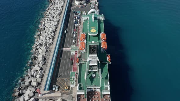 Passenger ferry ship in port dock aerial view