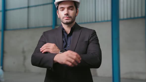 Portrait Confident Factory Manager Wearing Suit and Safety Helmet
