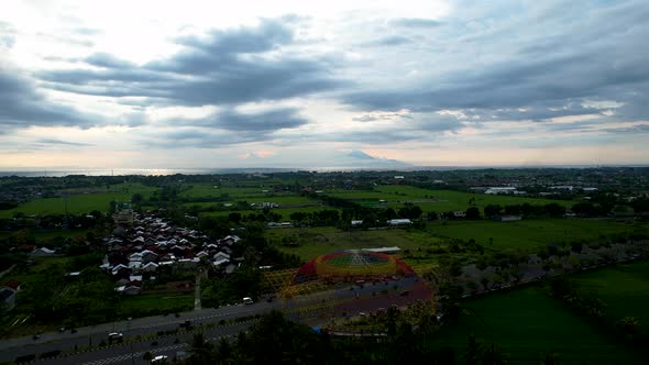 Aerial view of the city colorful Monument Tembolak Rainbow on Mataram.