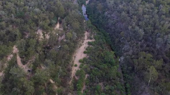 Drone aerial view of Freestone Creek forest during day time sunny. Briagolong Australia.