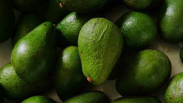 Close-up avocado fruits in basket at supermarket 4k