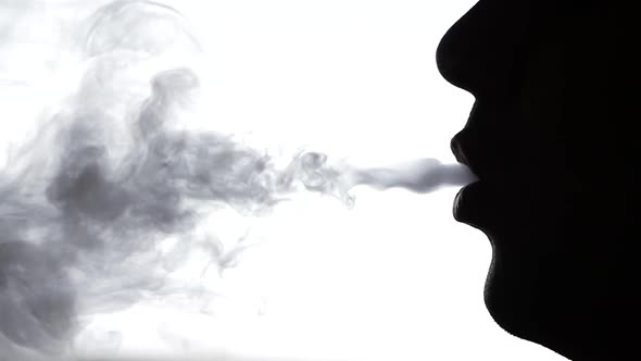 Smoke From the Man Mouth, Close Up, Silhouette, Slow Motion