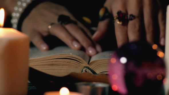 Fortune-Teller read ancient book.