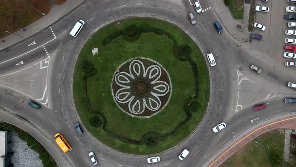 Aerial View Timelapse of Roundabout Road with Circular Cars