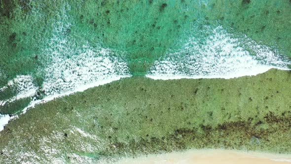 Indonesia Green Coast Showing A Beautiful Soft Waves Moving Altogether Creating Foamy Waves At The C