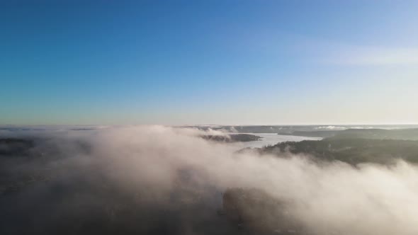 Aerial Above the Clouds during Sunrise in Midwest Ozarks Landscape