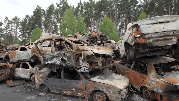 A Lot of Shot and Destroyed Civilian Cars at the Car Cemetery in Irpin Ukraine