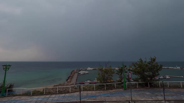 Timelapse of Cloudscape, Sea and Quay in Greece